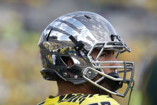 EUGENE, OR - SEPTEMBER 08:  Hroniss Grasu #55 of University of Oregon Ducks fans during the first half of the game against Fresno State Bulldogs at Autzen Stadium on September 8, 2012 in Eugene, Oregon.  (Photo by Kevin Casey/Getty Images)