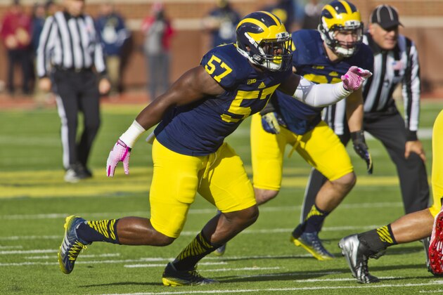 Michigan defensive end Frank Clark (57) in the first quarter of an NCAA college football game against Indiana in Ann Arbor, Mich., Saturday, Nov. 1, 2014. (AP Photo/Tony Ding)
