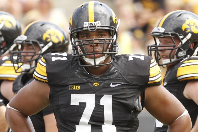 IOWA CITY, IOWA- SEPTEMBER 7:  Defensive lineman Carl Davis #71 of the Iowa Hawkeyes during a break in the action in the fourth quarter against the Missouri State Bears on September 7, 2013 at Kinnick Stadium in Iowa City, Iowa. Iowa won 28-14. (Photo by Matthew Holst/Getty Images)