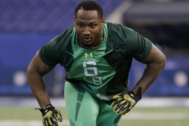 TCU linebacker Paul Dawson runs a drill at the NFL football scouting combine in Indianapolis, Sunday, Feb. 22, 2015. (AP Photo/Julio Cortez)
