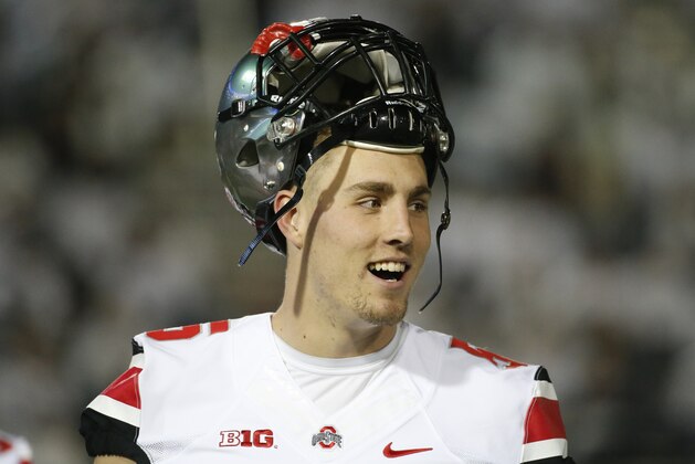 Ohio State tight end Jeff Heuerman warms up before an NCAA college football game against Penn State in State College, Pa., Saturday, Oct. 25, 2014. (AP Photo/Gene J. Puskar)