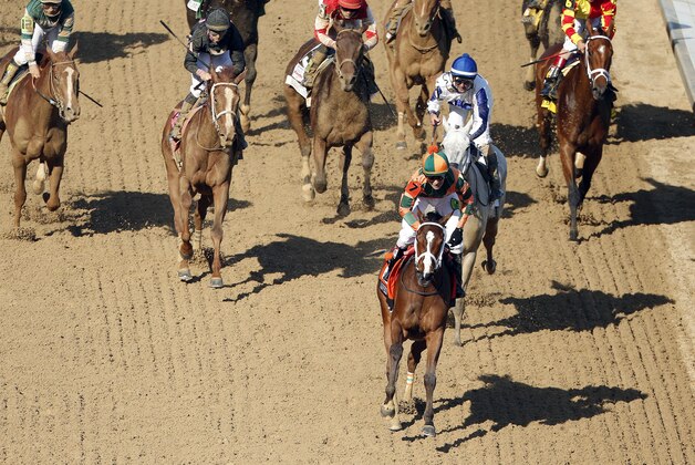 Kerwin D. Clark rides Lovely Maria to victory during the 141st running of the Kentucky Oaks horse race at Churchill Downs Friday, May 1, 2015, in Louisville, Ky.  (AP Photo/Charlie Riedel)
