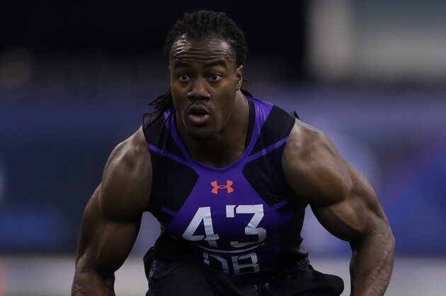 USC defensive back Josh Shaw runs a drill at the NFL football scouting combine in Indianapolis, Monday, Feb. 23, 2015. (AP Photo/Julio Cortez)