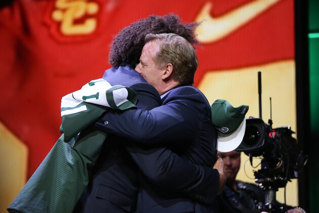 CHICAGO, IL - APRIL 30:  Leonard Williams of the USC Trojans hugs NFL Commissioner Roger Goodell after being chosen #6 overall by the New York Jets during the first round of the 2015 NFL Draft at the Auditorium Theatre of Roosevelt University on April 30, 2015 in Chicago, Illinois.  (Photo by Jonathan Daniel/Getty Images)