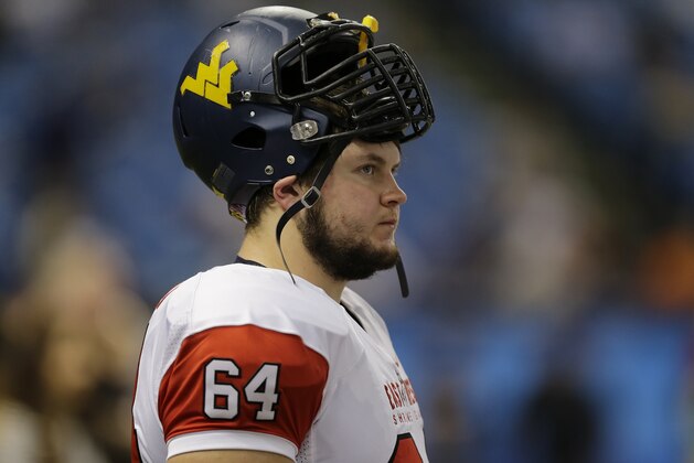 East offensive lineman Mark Glowinski (64), of West Virginia, during the first quarter of the East-West Shrine college football game Saturday, Jan. 17, 2015, in St. Petersburg, Fla. (AP Photo/Chris O'Meara)