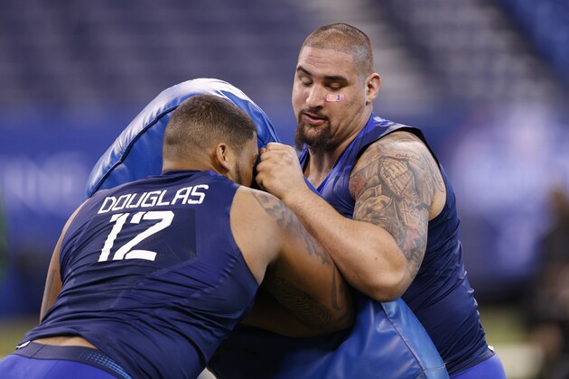 INDIANAPOLIS, IN - FEBRUARY 20: Offensive linemen Jon Feliciano of Miami and Jamil Douglas of Arizona State participate in a blocking drill during the 2015 NFL Scouting Combine at Lucas Oil Stadium on February 20, 2015 in Indianapolis, Indiana. (Photo by Joe Robbins/Getty Images)