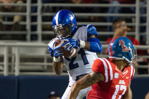 OXFORD, MS - SEPTEMBER 27: Defensive back Bobby McCain #21 of the Memphis Tigers intercepts a pass intended for tight end Evan Engram #17 of the Mississippi Rebels on September 27, 2014 at Vaught-Hemingway Stadium in Oxford, Mississippi. At halftime the Mississippi Rebels leads the Memphis Tigers 7-3. (Photo by Michael Chang/Getty Images)