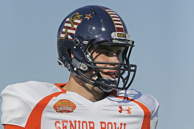 Navy long snapper Joe Cardona (93) looks on during NCAA college football practice for the Senior Bowl, Wednesday, Jan. 21, 2015, at Ladd-Peebles Stadium in Mobile, Ala. (AP Photo/Brynn Anderson)