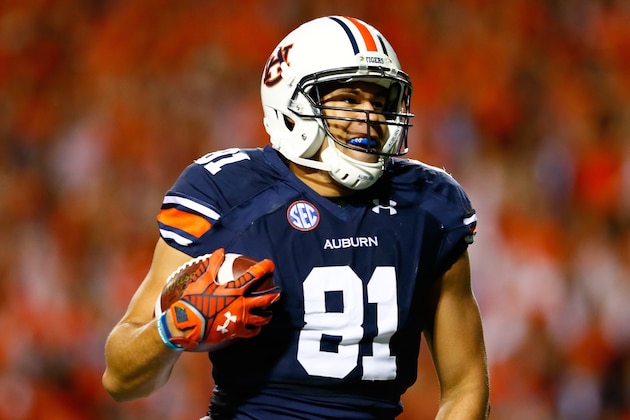 AUBURN, AL - OCTOBER 04:  C.J. Uzomah #81 of the Auburn Tigers pulls in this reception for a touchdown against the LSU Tigers at Jordan Hare Stadium on October 4, 2014 in Auburn, Alabama.  (Photo by Kevin C. Cox/Getty Images)