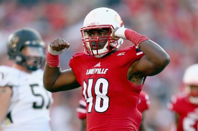 LOUISVILLE, KY - SEPTEMBER 27:  Deiontrez Mount #48 of the Louisville Cardinals celebrates after sacking the quarterback during the game against the Wake Forest Demon Deacons at Papa John's Cardinal Stadium on September 27, 2014 in Louisville, Kentucky.  (Photo by Andy Lyons/Getty Images)