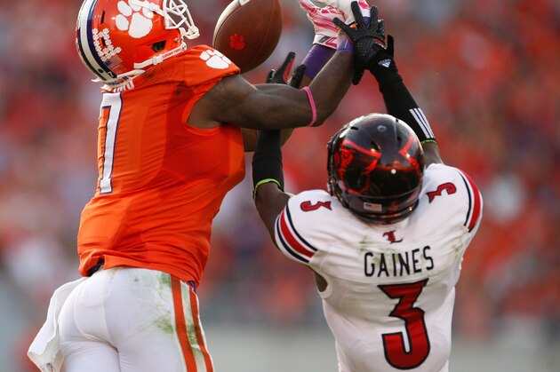 CLEMSON, SC - OCTOBER 11: Mike Williams #7 of the Clemson Tigers attempts to catch a pass over Charles Gaines #3 of the Louisville Cardinals during the game at Memorial Stadium on October 11, 2014 in Clemson, South Carolina. (Photo by Tyler Smith/Getty Images)