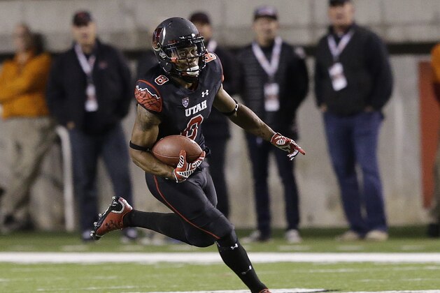 Utah wide receiver Kaelin Clay (8) brings the ball up field in the third quarter during an NCAA college football game against Southern California Saturday, Oct. 25, 2014, in Salt Lake City. (AP Photo/Rick Bowmer)
