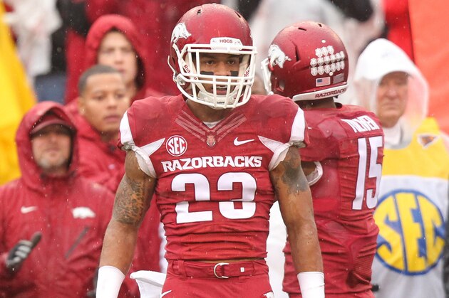 Nov 22, 2014; Fayetteville, AR, USA; Arkansas Razorbacks cornerback Tevin Mitchell (23) during the game against the Ole Miss Rebels at Donald W. Reynolds Razorback Stadium. Arkansas defeated Mississippi 30-0. Mandatory Credit: Nelson Chenault-USA TODAY Sports