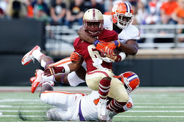 CHESTNUT HILL, MA - OCTOBER 18:  Sherman Alston #6 of the Boston College Eagles is brought down by Tony Steward #7 of the Clemson Tigers in the first half against the Clemson Tigers at Alumni Stadium on October 18, 2014 in Chestnut Hill, Massachusetts. (Photo by Jim Rogash/Getty Images)