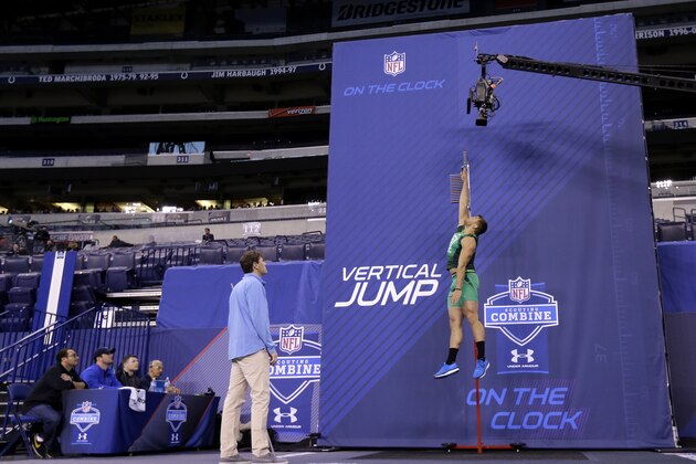 Tennessee-Chattanooga defensive lineman Davis Tull runs a drill at the NFL football scouting combine in Indianapolis, Sunday, Feb. 22, 2015. (AP Photo/Julio Cortez)