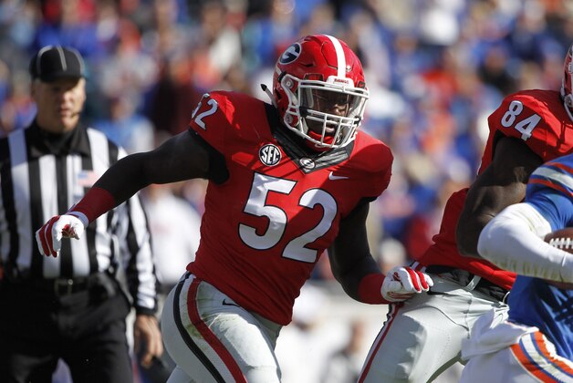 Nov 1, 2014; Jacksonville, FL, USA; Georgia Bulldogs linebacker Amarlo Herrera (52) rushes against the Florida Gators during the first half at EverBank Field. Mandatory Credit: Kim Klement-USA TODAY Sports