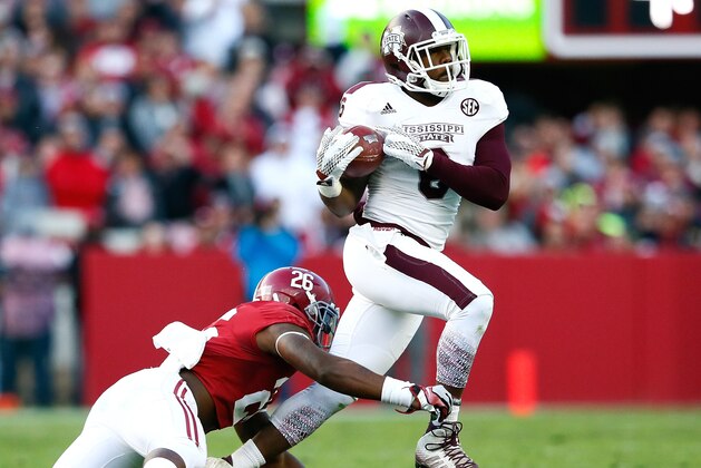 TUSCALOOSA, AL - NOVEMBER 15:  Malcolm Johnson #6 of the Mississippi State Bulldogs pulls in this reception against Landon Collins #26 of the Alabama Crimson Tide at Bryant-Denny Stadium on November 15, 2014 in Tuscaloosa, Alabama.  (Photo by Kevin C. Cox/Getty Images)