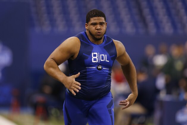 LSU offensive lineman La'El Collins runs the 40-yard dash at the NFL football scouting combine in Indianapolis, Friday, Feb. 20, 2015. (AP Photo/Julio Cortez)