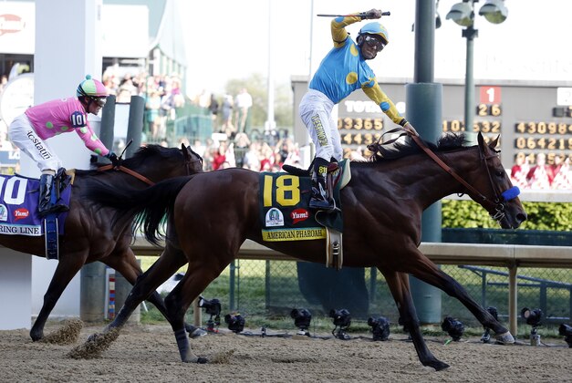 May 2, 2015; Louisville, KY, USA; Victor Espinoza aboard American Pharoah celebrates winning the 141st Kentucky Derby at Churchill Downs. Mandatory Credit: Peter Casey-USA TODAY Sports May 2, 2015; Louisville, KY, USA; Victor Espinoza aboard American Pharoah celebrates winning the 141st Kentucky Derby at Churchill Downs. Mandatory Credit: Peter Casey-USA TODAY Sports