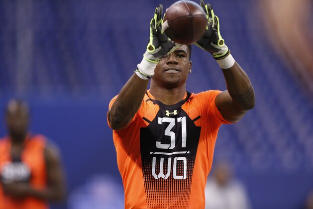 William & Mary wide receiver Tre Mcbride runs a drill at the NFL football scouting combine in Indianapolis, Saturday, Feb. 21, 2015. (AP Photo/Julio Cortez)