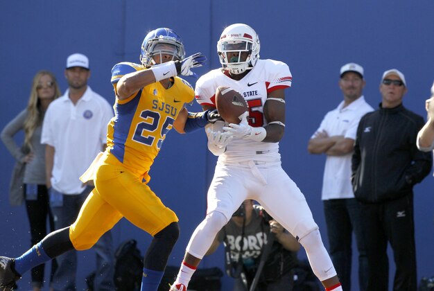 Nov 29, 2013; San Jose, CA, USA; Fresno State Bulldogs wide receiver Davante Adams (15) catches a touchdown pass in front of San Jose State Spartans cornerback Akeem King (25) in the first quarter at Spartan Stadium. Mandatory Credit: Cary Edmondson-USA TODAY Sports