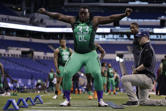 Southern Mississippi defensive lineman Rakeem Nunez-Roches runs a drill at the NFL football scouting combine in Indianapolis, Sunday, Feb. 22, 2015. (AP Photo/Julio Cortez)