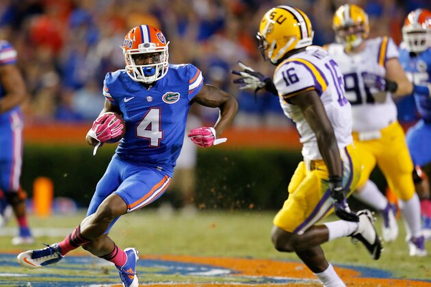GAINESVILLE, FL - OCTOBER 11: Andre Debose #4 of the Florida Gators carries for 34 yards during the first quarter of the game against the LSU Tigers at Ben Hill Griffin Stadium on October 11, 2014 in Gainesville, Florida.  (Photo by Rob Foldy/Getty Images)