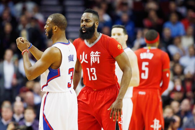 HOUSTON, TX - FEBRUARY 25:  James Harden #13 of the Houston Rockets shouts at  Chris Paul #3 of the Los Angeles Clippers after a foul during their game at the Toyota Center on February 25, 2015 in Houston, Texas. NOTE TO USER: User expressly acknowledges and agrees that, by downloading and/or using this photograph, user is consenting to the terms and conditions of the Getty Images License Agreement.  (Photo by Scott Halleran/Getty Images)