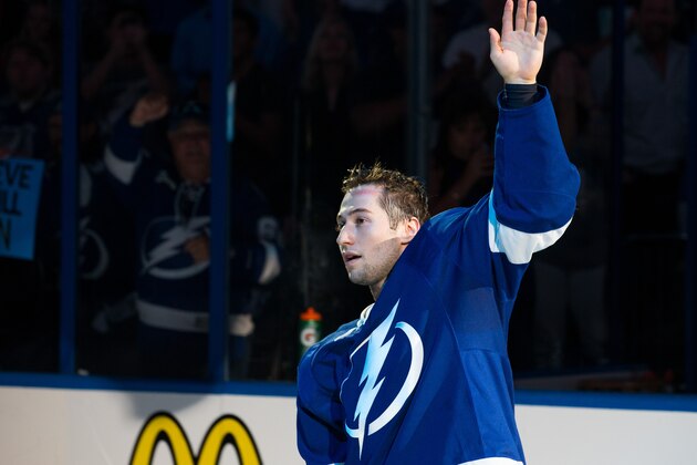 TAMPA, FL - APRIL 18: Tyler Johnson #9 of the Tampa Bay Lightning thanks fans for their support after the win against the Detroit Red Wings during Game Two of the Eastern Conference Quarterfinals during the 2015 NHL Stanley Cup Playoffs at the Amalie Arena on April 18, 2015 in Tampa, Florida.  (Photo by Scott Audette/NHLI via Getty Images)