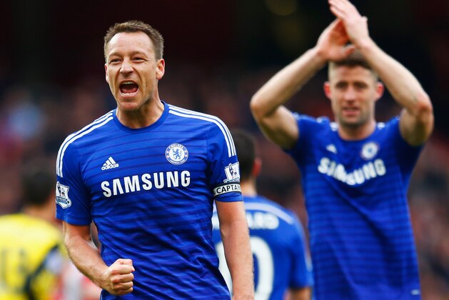 LONDON, ENGLAND - APRIL 26:  John Terry (26) and Gary Cahill of Chelsea celebrate after the Barclays Premier League match between Arsenal and Chelsea at Emirates Stadium on April 26, 2015 in London, England.  (Photo by Julian Finney/Getty Images)