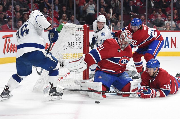 MONTREAL, QC - MAY 01: Carey Price #31 of the Montreal Canadiens blocks the puck against Nikita Kucherov #86 of theTampa Bay Lightning in Game Five of the Eastern Conference Semifinals during the 2015 NHL Stanley Cup Playoffs at the Bell Centre on May 1, 2015 in Montreal, Quebec, Canada. (Photo by Francois Lacasse/NHLI via Getty Images)