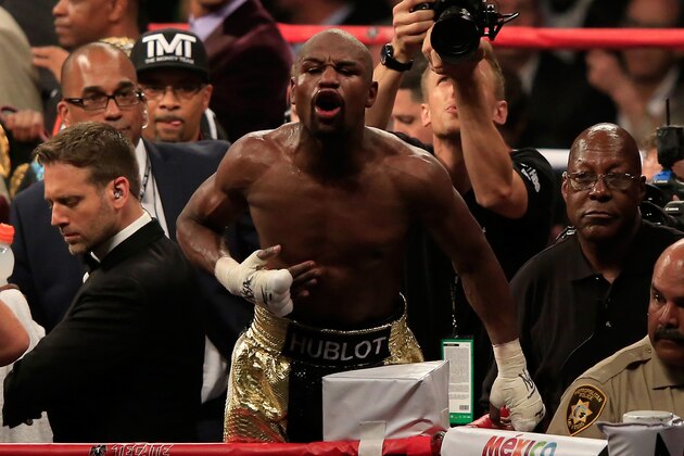 LAS VEGAS, NV - MAY 02:  Floyd Mayweather Jr. reacts after the final round against Manny Pacquiao at the welterweight unification championship bout on May 2, 2015 at MGM Grand Garden Arena in Las Vegas, Nevada.  (Photo by Jamie Squire/Getty Images)