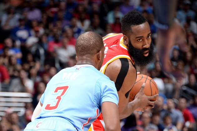 LOS ANGELES, CA - MARCH 15: James Harden #13 of the Houston Rockets handles the ball against the Los Angeles Clippers on March 15, 2015 at STAPLES Center in Los Angeles, California. NOTE TO USER: User expressly acknowledges and agrees that, by downloading and/or using this photograph, User is consenting to the terms and conditions of the Getty Images License Agreement. Mandatory Copyright Notice: Copyright 2015 NBAE (Photo by Andrew Bernstein/NBAE via Getty Images)