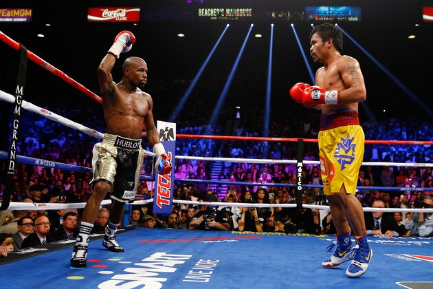 LAS VEGAS, NV - MAY 02:  Floyd Mayweather Jr. reacts in the twelfth round during the welterweight unification championship bout on May 2, 2015 at MGM Grand Garden Arena in Las Vegas, Nevada.  (Photo by Al Bello/Getty Images)