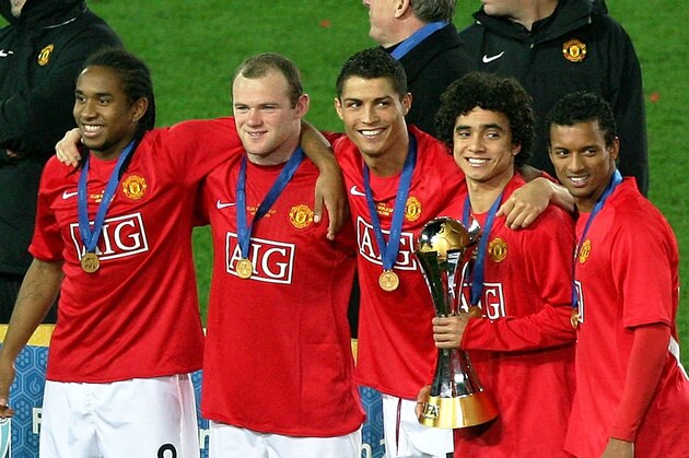 YOKOHAMA, JAPAN - DECEMBER 21:  (L-R) Anderson, Wayne Rooney, Cristiano Ronaldo, Rafael Da Silva and Nani of Manchester United pose with a trophy for photographer at a ceremony after the FIFA Club World Cup Japan 2008 final match between Manchester United and Liga de Quito at the International Stadium Yokohama on December 21, 2008 in Yokohama, Kanagawa, Japan.  (Photo by Kiyoshi Ota/Getty Images)