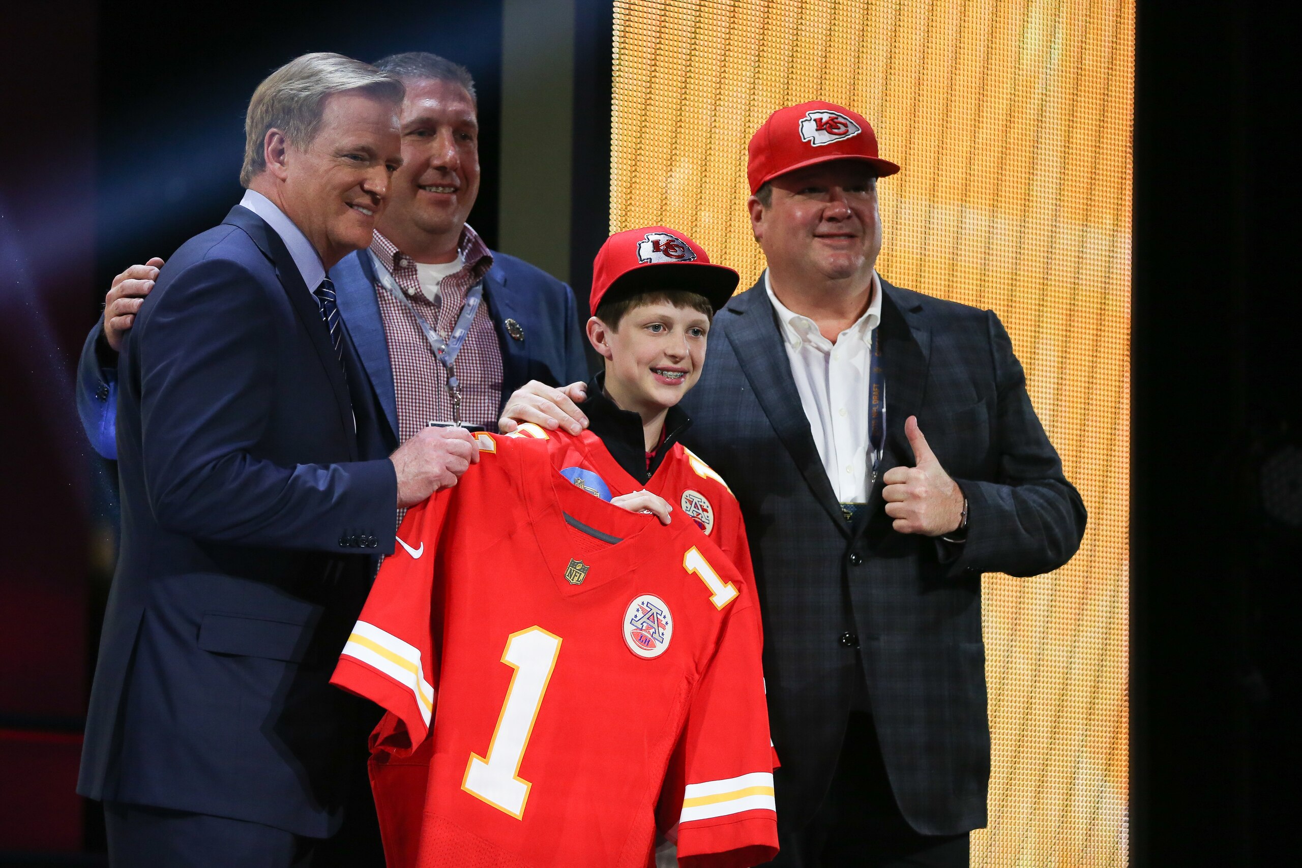 CHICAGO, IL - APRIL 30:  NFL Commissioner Roger Goodell holds up a jersey after Marcus Peters of the Washington Huskies was picked #18 overall by the Kansas City Chiefs during the first round of the 2015 NFL Draft at the Auditorium Theatre of Roosevelt University on April 30, 2015 in Chicago, Illinois.  (Photo by Jonathan Daniel/Getty Images)