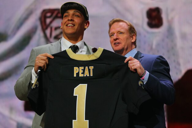 Apr 30, 2015; Chicago, IL, USA; Andrus Peat (Stanford) poses for a photo with NFL commissioner Roger Goodell after being selected as the number 13th overall pick to the New Orleans Saints in the first round of the 2015 NFL Draft at the Auditorium Theatre of Roosevelt University. Mandatory Credit: Dennis Wierzbicki-USA TODAY Sports