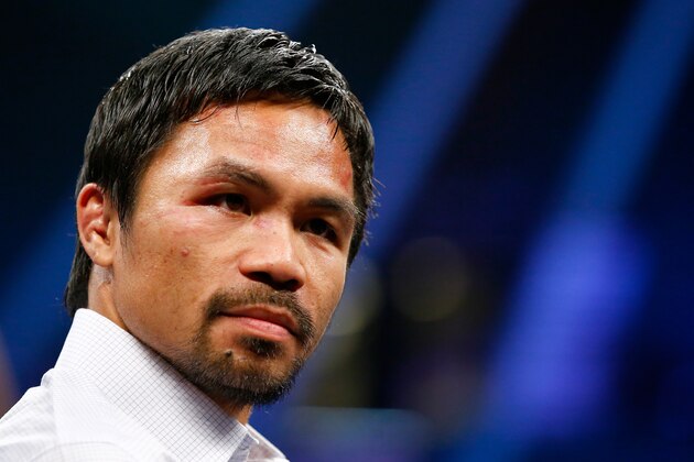 LAS VEGAS, NV - MAY 02:  Manny Pacquiao answers questions during the post-fight news conference after losing to Floyd Mayweather Jr. in their welterweight unification championship bout on May 2, 2015 at MGM Grand Garden Arena in Las Vegas, Nevada.  (Photo by Al Bello/Getty Images)