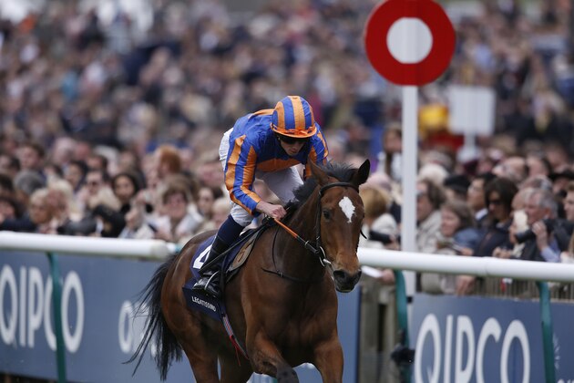 NEWMARKET, ENGLAND - MAY 03: Ryan Moore riding Legatissimo win The Qipco 1000 Guineas Stakes Newmarket racecourse on May 03, 2015 in Newmarket, England. (Photo by Alan Crowhurst/Getty Images)