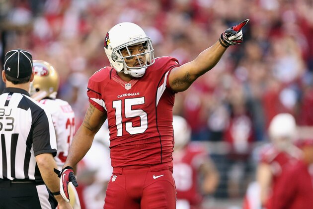 GLENDALE, AZ - DECEMBER 29:  Michael Floyd #15 of the Arizona Cardinals reacts after a run against the San Francisco 49ers during a game at University of Phoenix Stadium on December 29, 2013 in Glendale, Arizona.  (Photo by Christian Petersen/Getty Images)