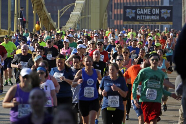 Runners in the Pittsburgh Marathon cross the Andy Warhol Bridge in downtown Pittsburgh Sunday, May 3, 2015. More than 40,000 runners are expected to be part of the 36th annual Broad Street Run, billed as the largest 10-mile road race and as the largest city-sponsored race in the U.S. (AP Photo/Gene J. Puskar)