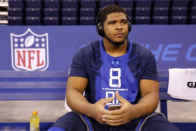 LSU offensive lineman La'El Collins sits on a bench at the NFL football scouting combine in Indianapolis, Friday, Feb. 20, 2015. (AP Photo/Julio Cortez)