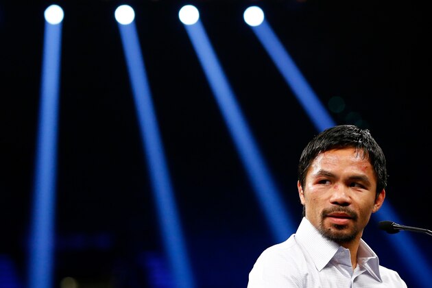 LAS VEGAS, NV - MAY 02:  Manny Pacquiao answers questions during the post-fight news conference after losing to Floyd Mayweather Jr. in their welterweight unification championship bout on May 2, 2015 at MGM Grand Garden Arena in Las Vegas, Nevada.  (Photo by Al Bello/Getty Images)