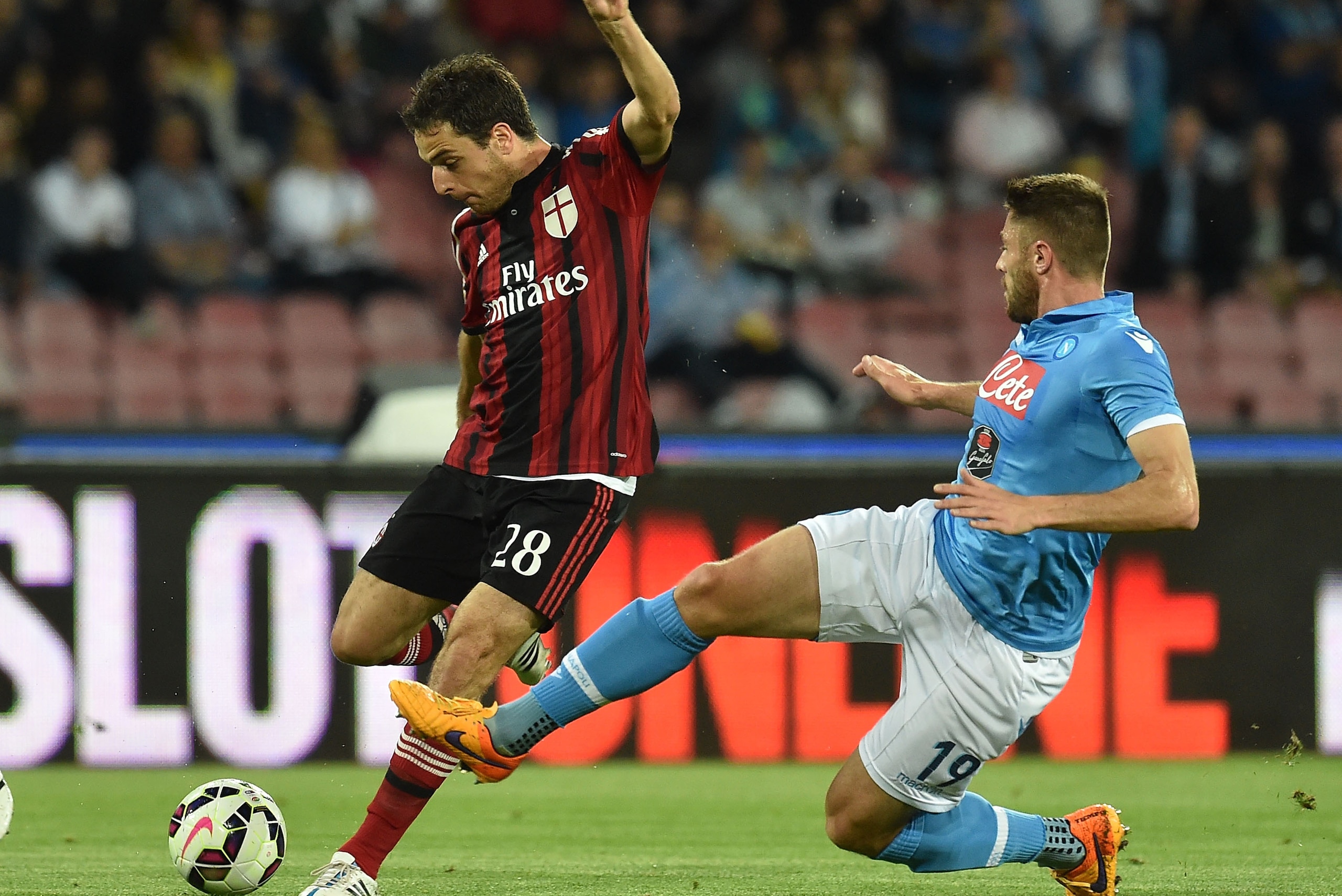 NAPLES, ITALY - MAY 03: Giacomo Bonaventura of Milan and David Lopez of Napoli in action during the Serie A match between SSC Napoli and AC Milan at Stadio San Paolo on May 3, 2015 in Naples, Italy.  (Photo by Giuseppe Bellini/Getty Images)