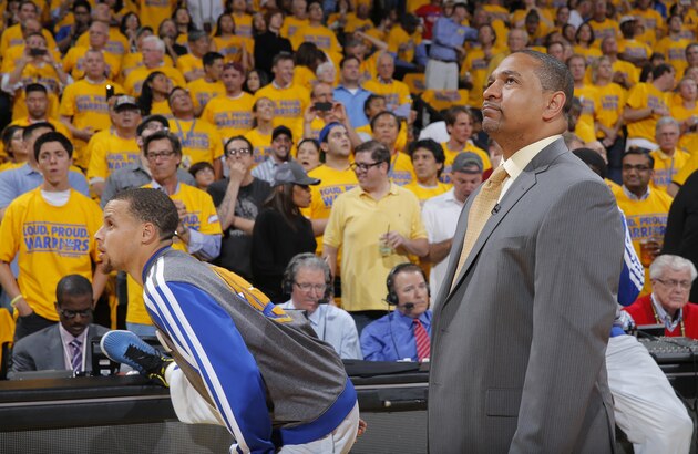 OAKLAND, CA - MAY 1: Head Coach Mark Jackson and Stephen Curry #30 of the Golden State Warriors in a game against the Los Angeles Clippers in Game Six of the Western Conference Quarterfinals during the 2014 NBA Playoffs at Oracle Arena on May 1, 2014 in Oakland, California. NOTE TO USER: User expressly acknowledges and agrees that, by downloading and/or using this Photograph, user is consenting to the terms and conditions of Getty Images License Agreement. Mandatory Copyright Notice: Copyright 2014 NBAE (Photo by Rocky Widner/NBAE via Getty Images)