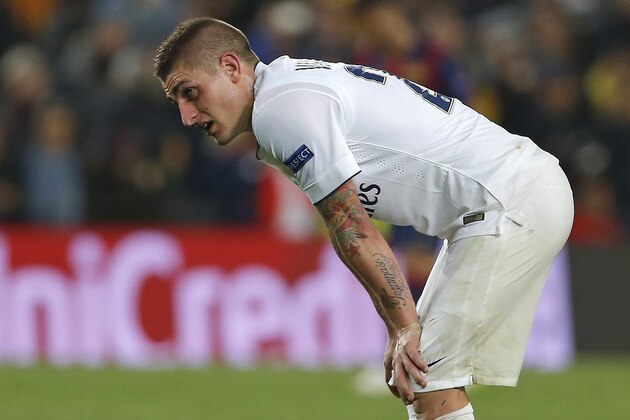 PSG's Marco Verratti bends over after the Champions League quarterfinal second leg soccer match between FC Barcelona and Paris Saint Germain at the Camp Nou Stadium in Barcelona, Spain, Tuesday, April 21, 2015.  Barcelona won the match 2-0 for a 5-1 aggregate win. (AP Photo/Emilio Morenatti)