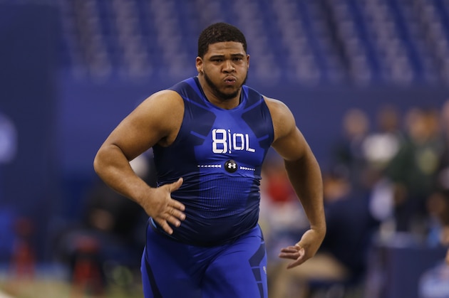 LSU offensive lineman La'El Collins runs the 40-yard dash at the NFL football scouting combine in Indianapolis, Friday, Feb. 20, 2015. (AP Photo/Julio Cortez)