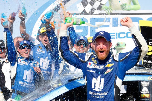 TALLADEGA, AL - MAY 03:  Dale Earnhardt Jr., driver of the #88 Nationwide Chevrolet, celebrates in victory lane after winning the NASCAR Sprint Cup Series GEICO 500 at Talladega Superspeedway on May 3, 2015 in Talladega, Alabama.  (Photo by Matt Sullivan/Getty Images)