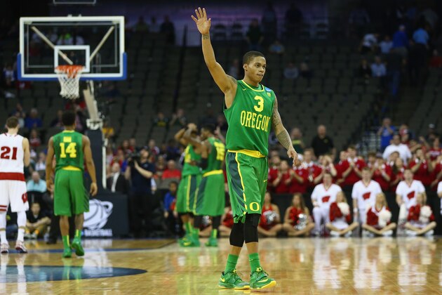 OMAHA, NE - MARCH 22: Joseph Young #3 of the Oregon Ducks waves while leaving the game against the Wisconsin Badgers during the third round of the 2015 NCAA Men's Basketball Tournament at the CenturyLink Center on March 22, 2015 in Omaha, Nebraska  (Photo by Ronald Martinez/Getty Images)