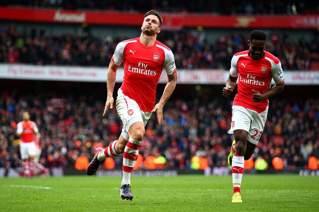 LONDON, ENGLAND - APRIL 04:  Olivier Giroud of Arsenal celebrates with Danny Welbeck of Arsenal after scoring his team's fourth goal during the Barclays Premier League match between Arsenal and Liverpool at Emirates Stadium on April 4, 2015 in London, England.  (Photo by Paul Gilham/Getty Images)